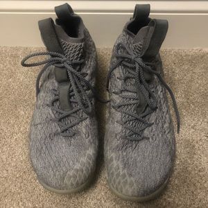 Lebron’s XV grey basketball shoes.